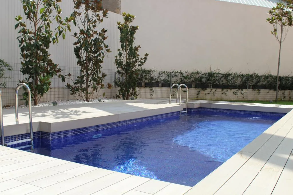 With pool and gym